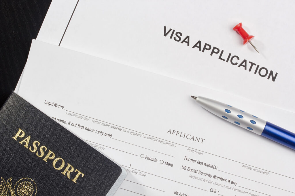 Closeup of a Visa application and passport