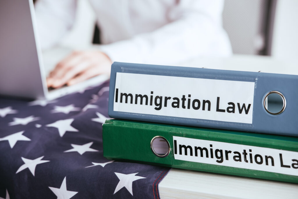 Closeup of immigration law binders and documentation